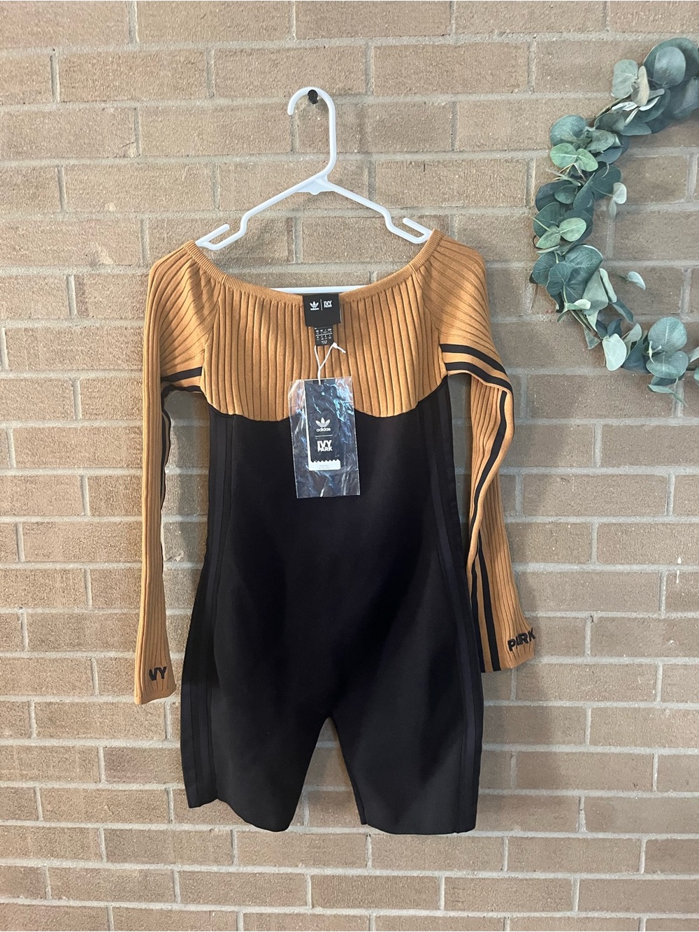IVY PARK Black and Mustard Ribbed Off-Shoulder Jumpsuit
